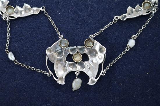 An early 20th century Art Nouveau white metal, enamel and seed pearl necklace, approx. 40cm.